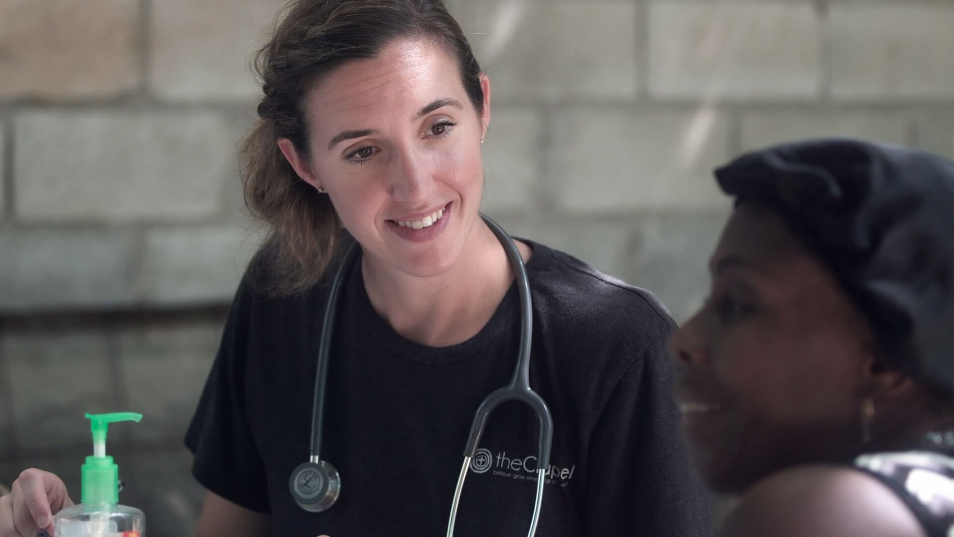 A doctor speaking to a patient