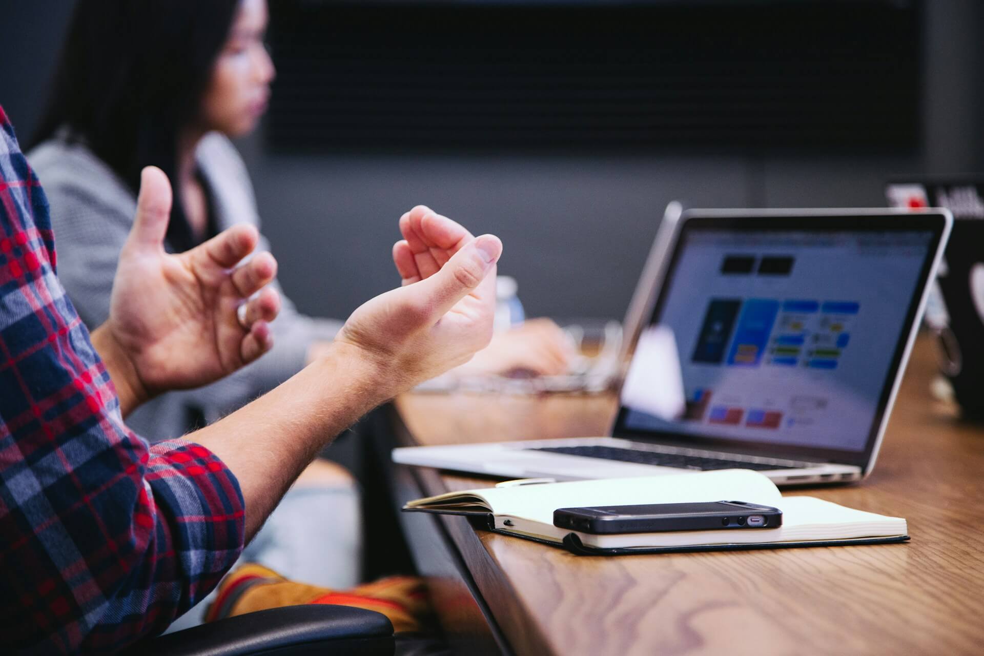 hand in a meeting