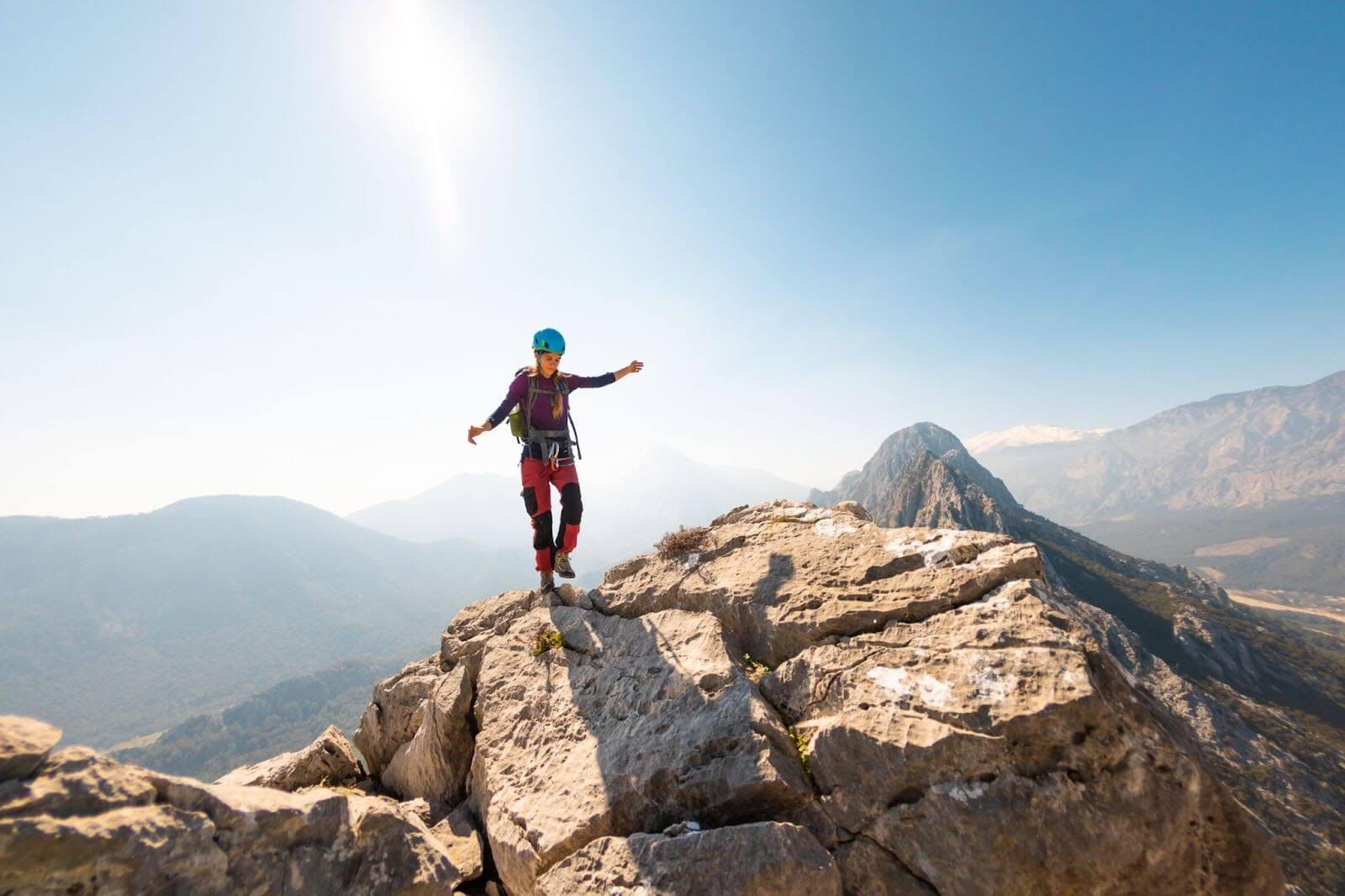 A woman hiking in the mountains